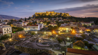 89909459 view of acropolis from a roof top coctail bar at sunset, greece.